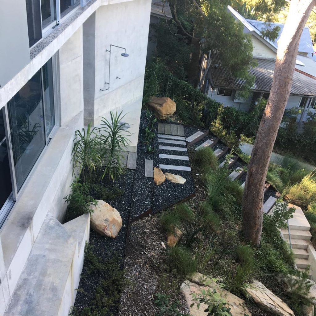 #polishedconcrete #beachhouse great #landscaping #slopes #redgumtree #outdoor #s...
