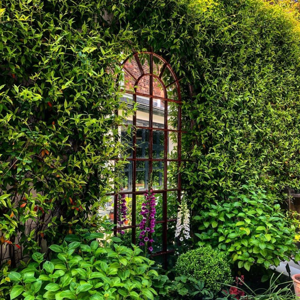 Mirror mirror in the wall...I make this lush oasis of a tiny London garden that ...