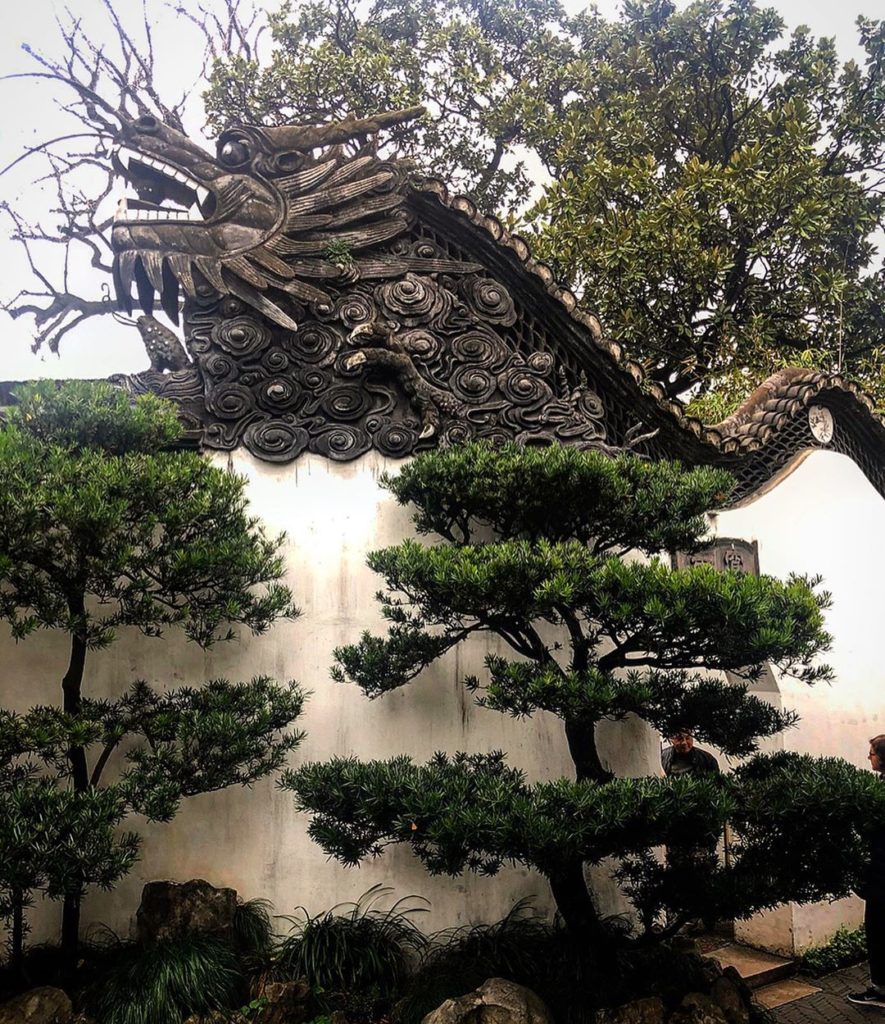 More from the Yu Gardens in Shanghai. I love the carved wooden dragon on top of ...