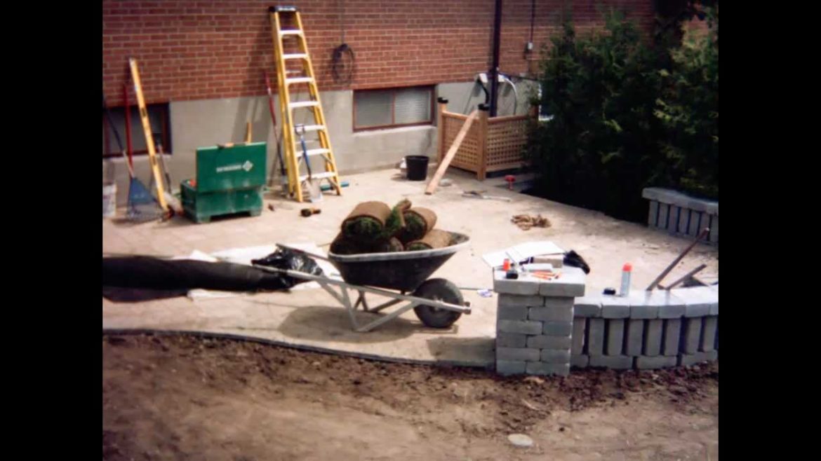 Landscape Construction: Backyard patio, seat wall, hedging cedars