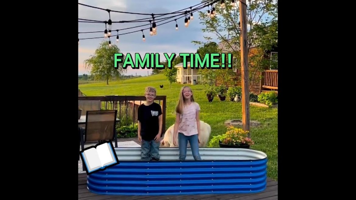 So sweet- A family of four assembles a garden bed!