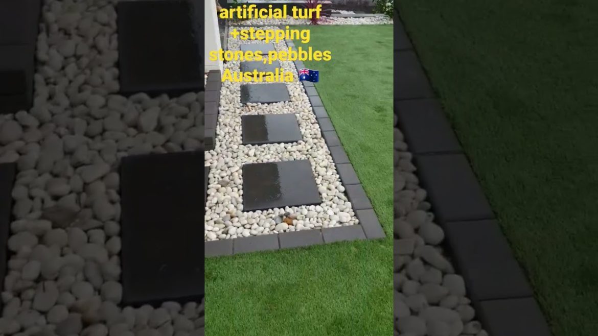 ARTIFICIAL turf laid + pebbles and edgings