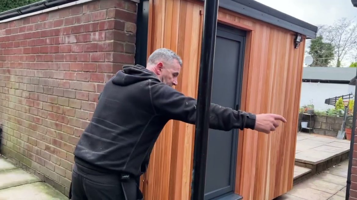 Garden room built where an old brick garage once stood