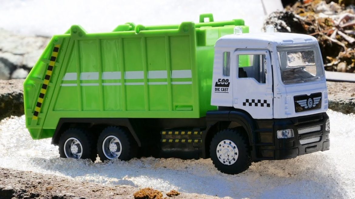 Decorate Japanese Snow Garden with Box Full of Garbage Trucks