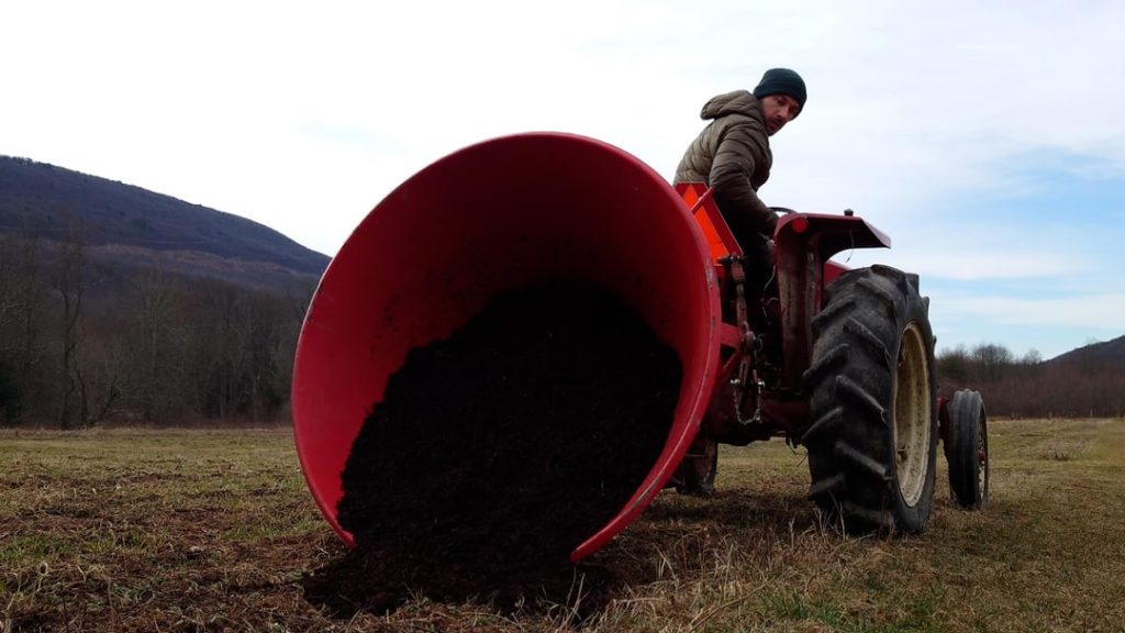 Cant find a manure spreader for a reasonable price so I spent $24 at harbor freight to convert my free spreader into a dump trailer. I used a 2-ton winch to replace my tractors toplink and can now raise and lower it fairly easy and spread my mushroom compost. Here are some pics in action Cant find a manure spreader for a reasonable price so I spent $24 at harbor freight to convert my free spreader into a dump trailer. I used a 2-ton winch to replace my tractors toplink and can now raise and lower it fairly easy and spread my mushroom compost. Here are some pics in action
