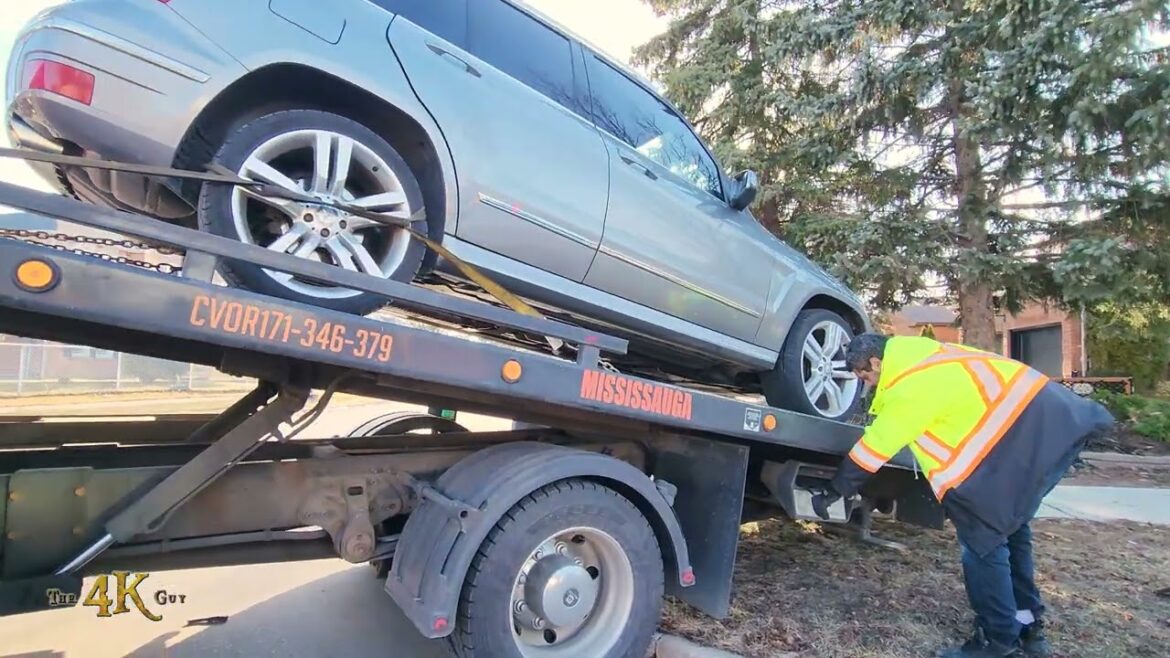 Mississauga: Towing a vehicle out of the front yard garden of home 2-16-2023 Mississauga: Towing a vehicle out of the front yard garden of home 2-16-2023