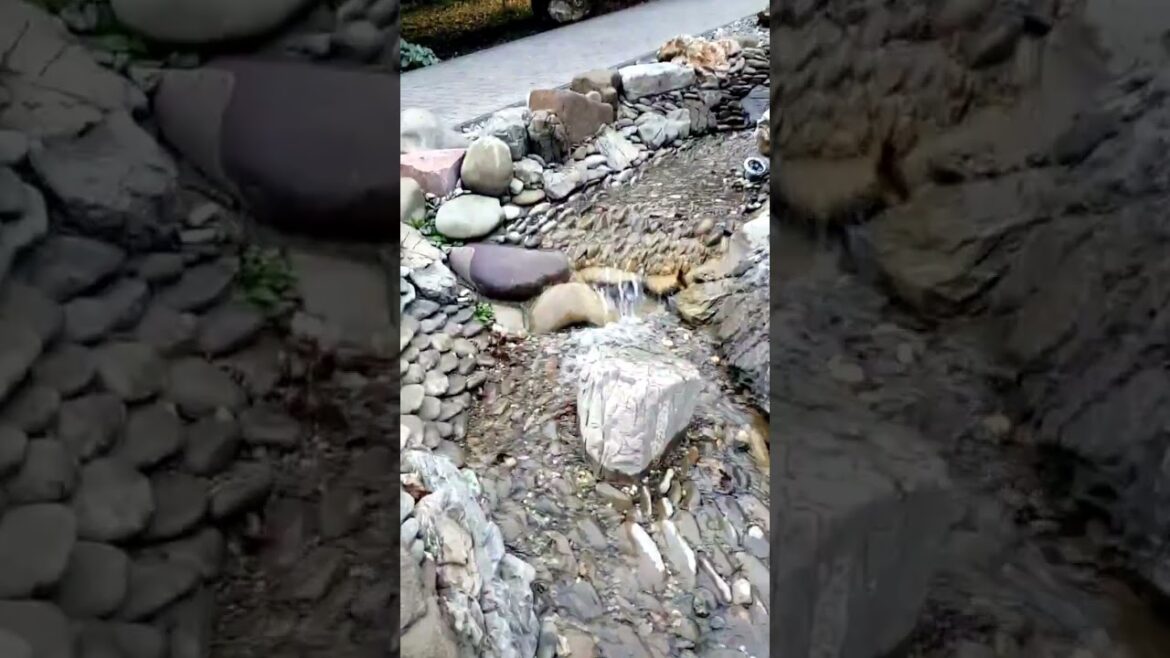 A Waterfall And Stream In The Rock Garden. Waterfall In Garden Design A Waterfall And Stream In The Rock Garden. Waterfall In Garden Design