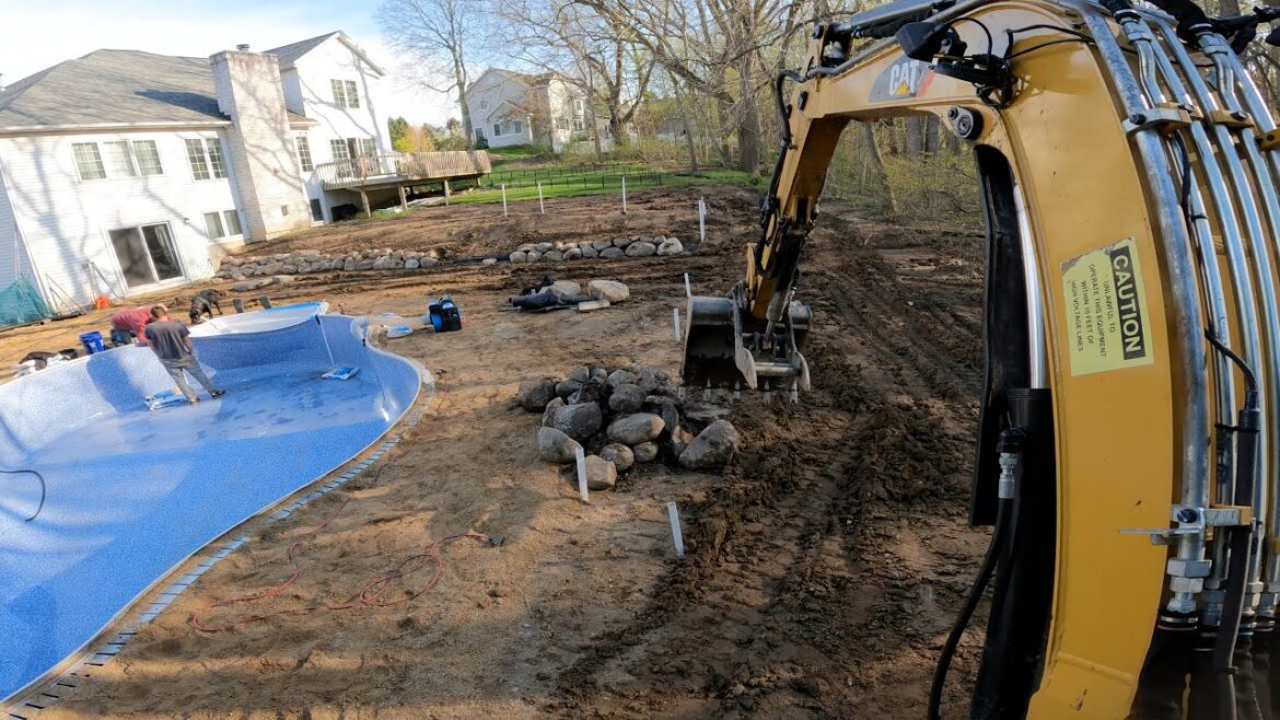 Landscaping an Entire Backyard for a New Pool with a Cat 305E2 Landscaping an Entire Backyard for a New Pool with a Cat 305E2
