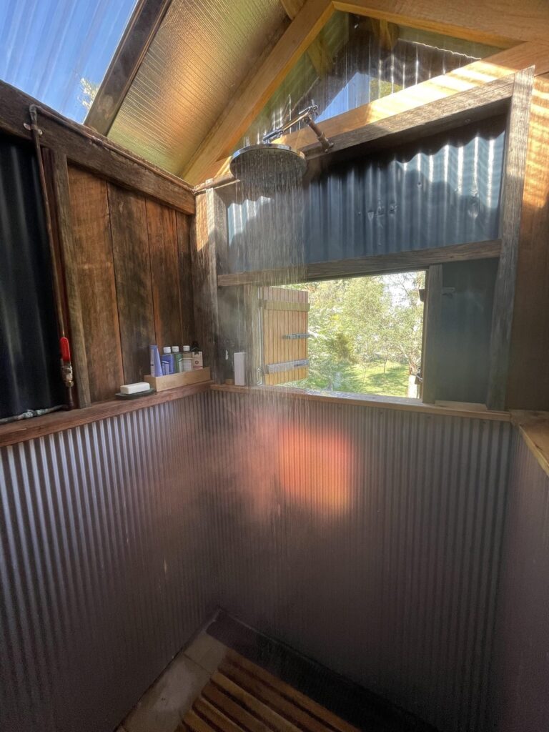 Mum’s $600aud Shower House. Mostly reclaimed materials. On 8 acre block in Tasmania, Australia. Progress pics & bonus outdoor bath at end.