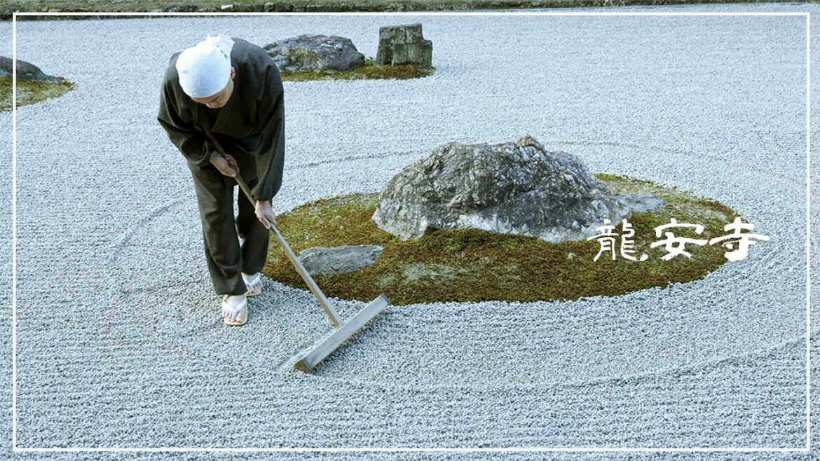 (Zen Garden) Raking wave patterns in the sand at the garden of Ryoan-ji Temple. (Zen Garden) Raking wave patterns in the sand at the garden of Ryoan-ji Temple.