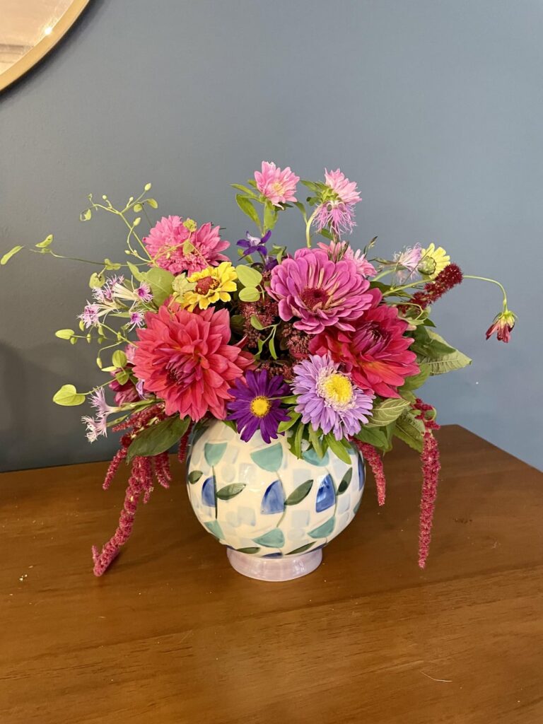 I love growing veggies but flowers are my favorite