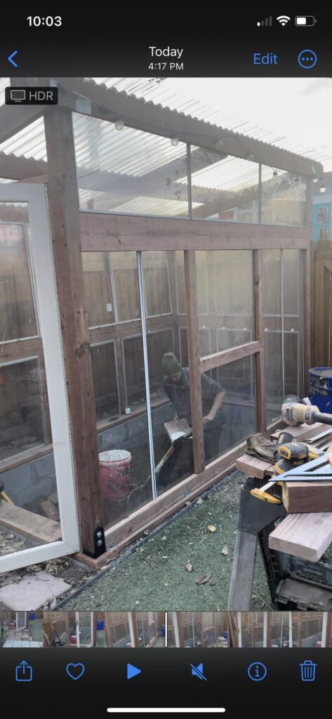 Finishing up the greenhouse. Attempting to do a thermal mass rocket stove.