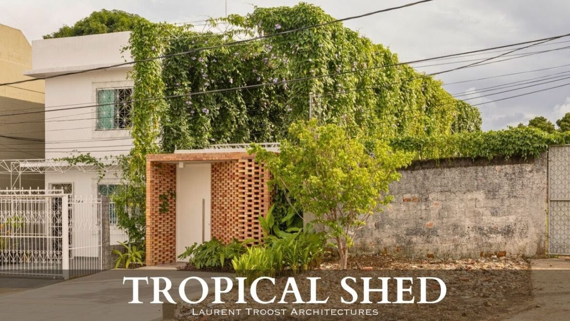 Home office design that has a trellis for vines and a garden yard - Tropical Shed