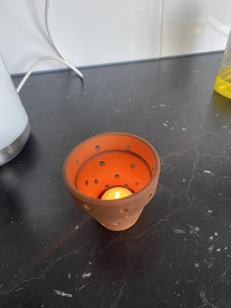 I made this small heater/humidifier for my tiny greenhouse. Can anyone tell me why this is a bad idea? I made this small heater/humidifier for my tiny greenhouse. Can anyone tell me why this is a bad idea?