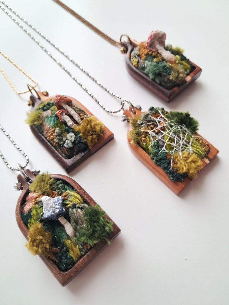 I embroidered tiny terrarium-inspired pendants