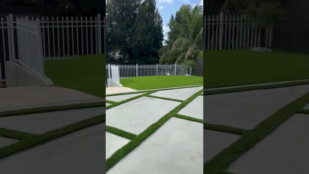 Concrete driveway, boat ramp and artificial grass #fakegrass #landscape #backyard #home #turfgrass