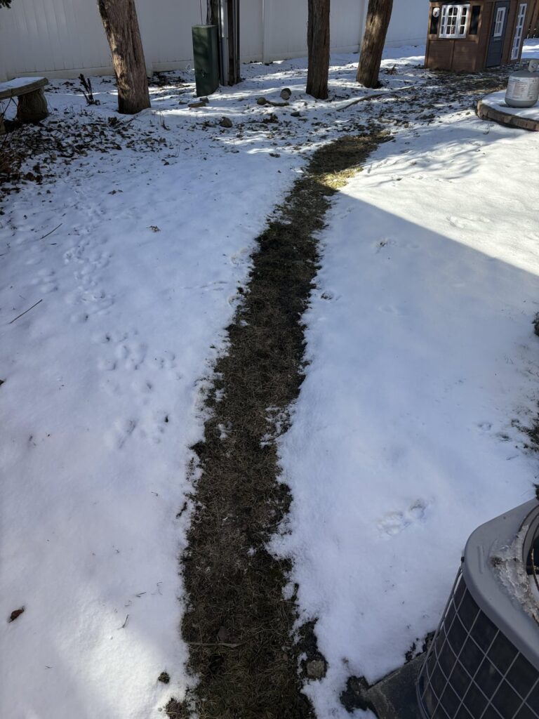 Weird line of melted snow