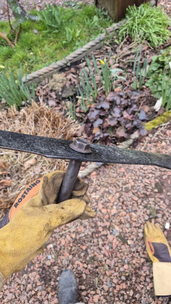 Can't unscrew mower blade