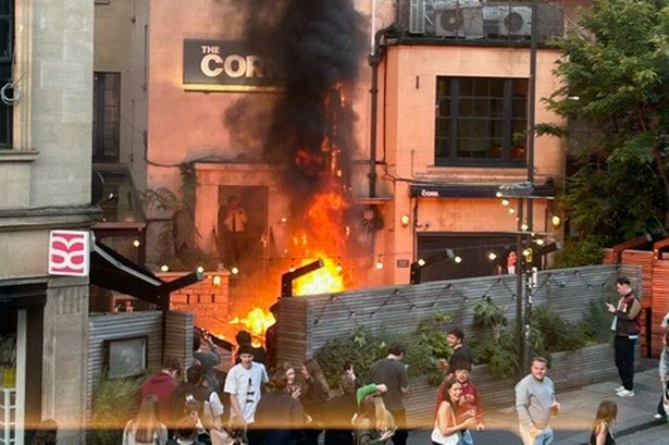 An umbrella caught fire in a pub garden