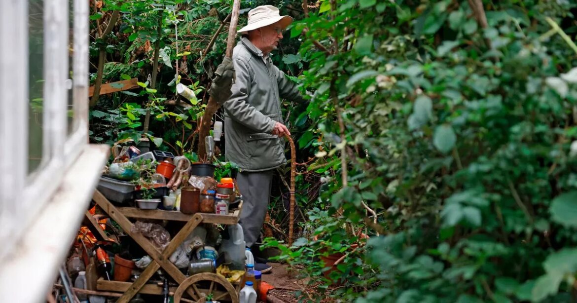 Eighty-year-old hoarder who has filled his garden with junk given ultimatum Ipso logo