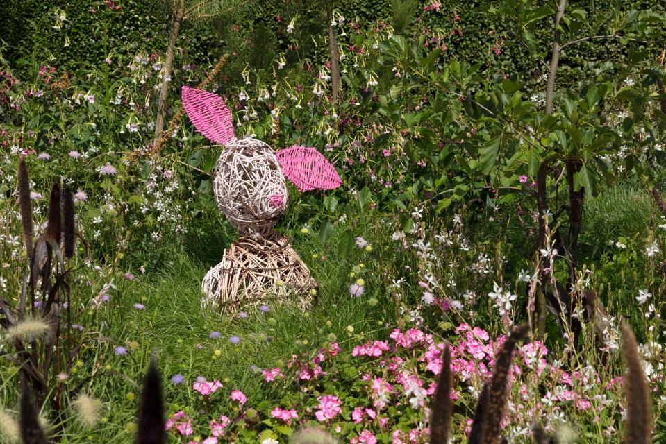 Wicker piglet garden display.