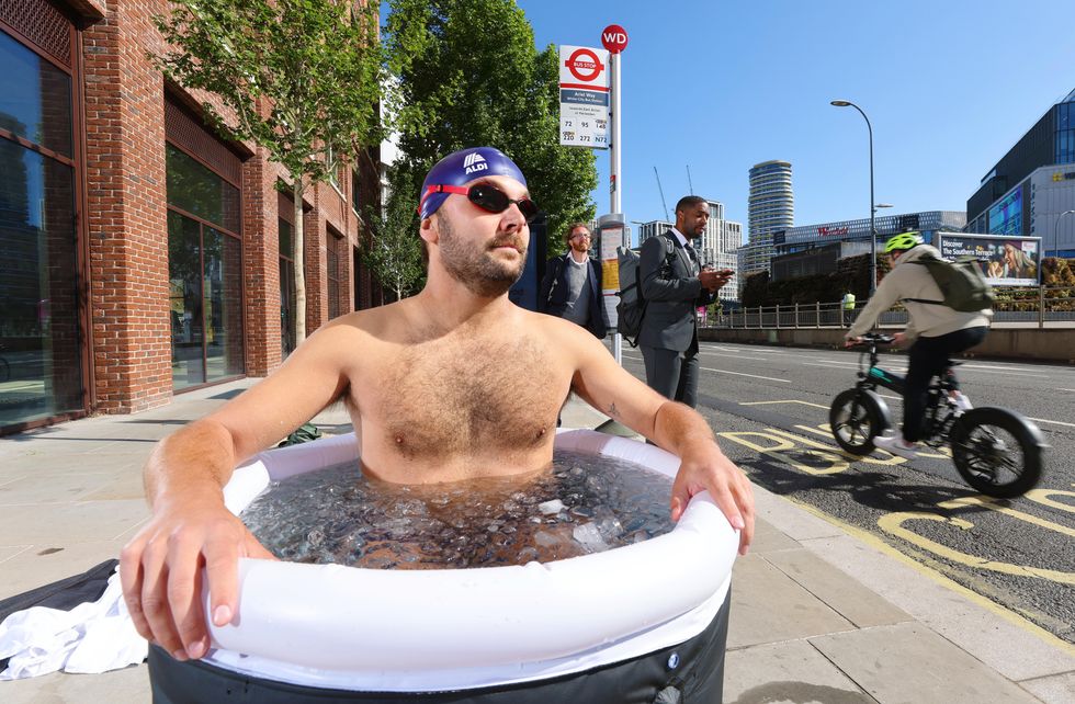 Man using Aldi's Inflatable Ice Bath in London