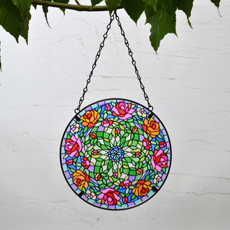 Round stained-glass hanging decoration with roses.