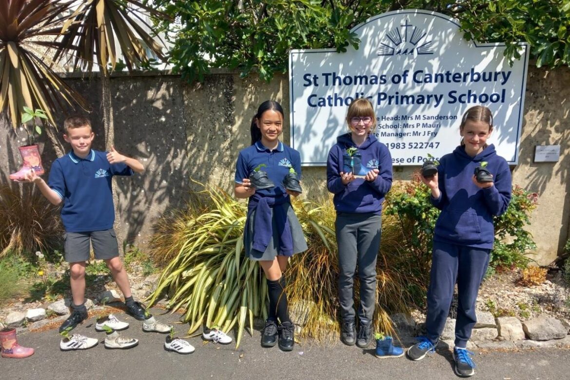 Pupils plant strawberries and pumpkins in their shoes for gardening festival Isle of Wight County Press