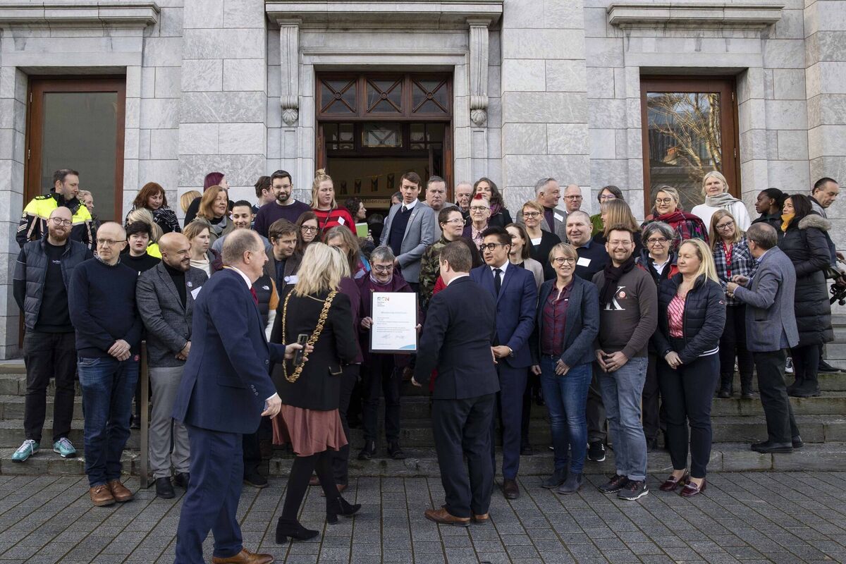 Siobhán O’Dowd, chair of Cork LGBTI+ Inter-Agency Group holding the RCN Membership Certificate surrounded by delegates. The certificate was presented to Cork City on the occasion that Cork City Council and Cork LGBTI+ Inter-Agency hosted the Global Rainbow Cities Network in 2020. Picture: Clare Keogh