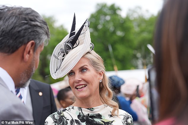 She collected her blonde tresses back into loose waves, and kept her make-up look simple and elegant