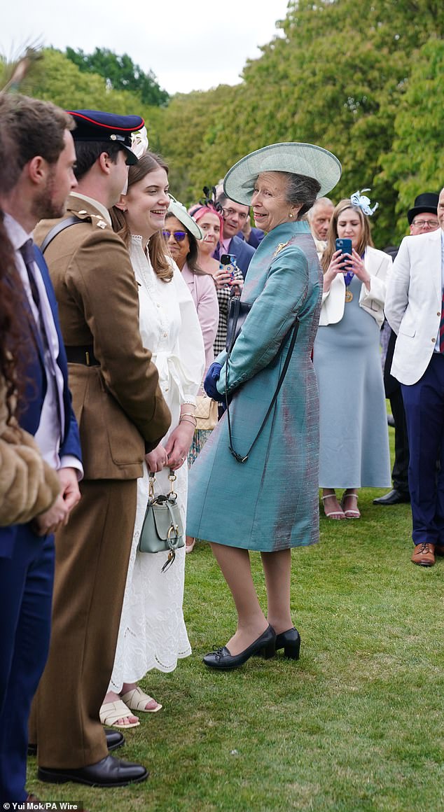 Anne sported an ornate head piece for the garden party, which took place this afternoon at the Palace