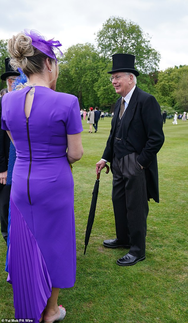 The Duke of Gloucester spoke to guests during the Royal Garden Party at Buckingham Palace today