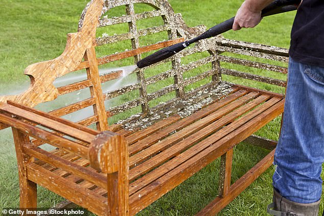 Speaking to FEMAIL, Heather Nixon from eco-cleaning company Bio-D says the trick to cleaning wooden garden furniture is to 'look out for furniture polishes that contain linseed oil, which nourishes and protects wood'