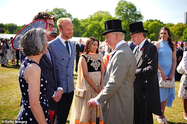 The royal (pictured) beamed as he spoke to guests at the event - it is thought that some 7,000 people were invited