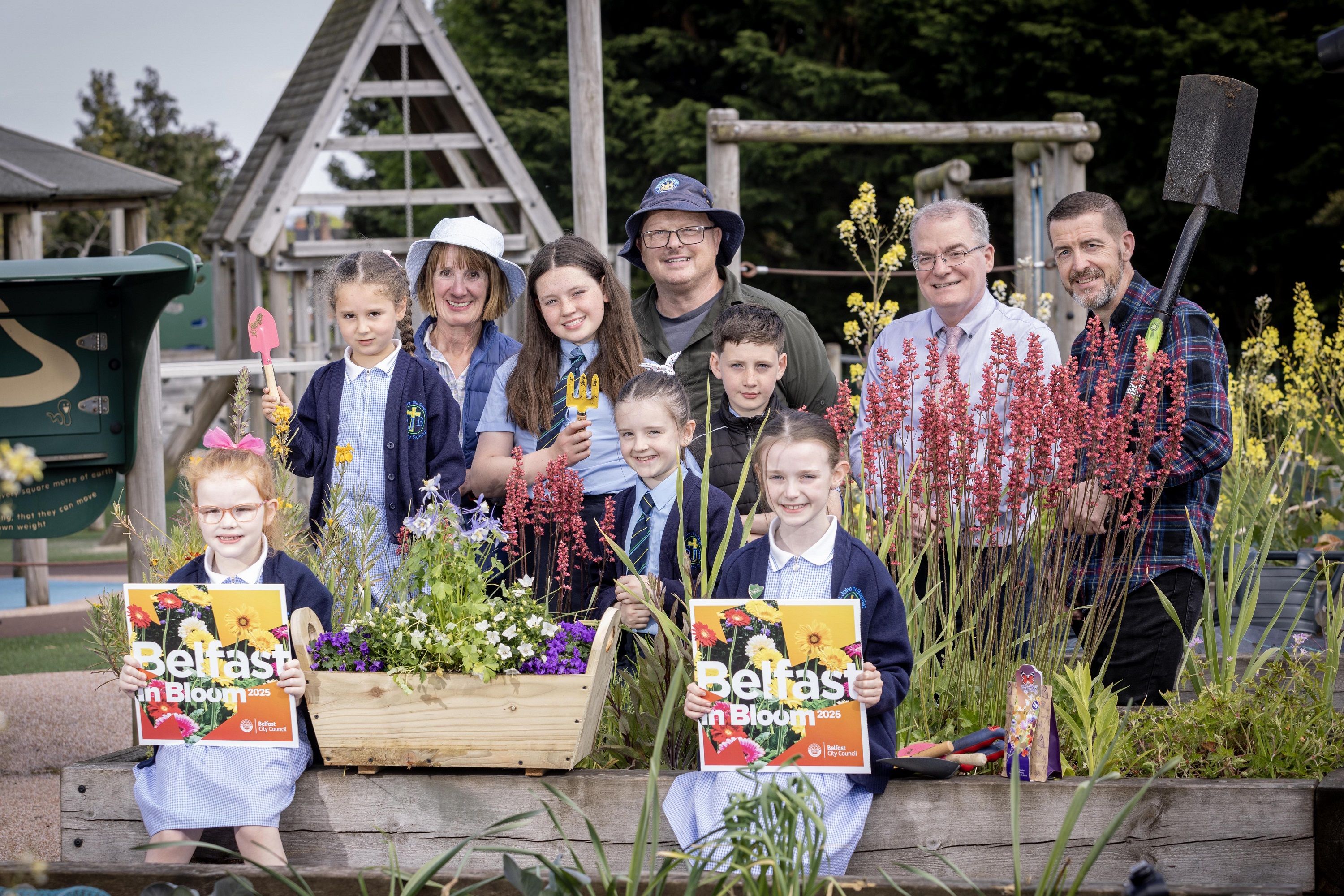 Pupils, parents and teachers from St John the Baptist PS join Principal Chris Donnelly and Councillor Matt Garrett, Deputy Chair of Belfast City Council’s People and Communities Committee