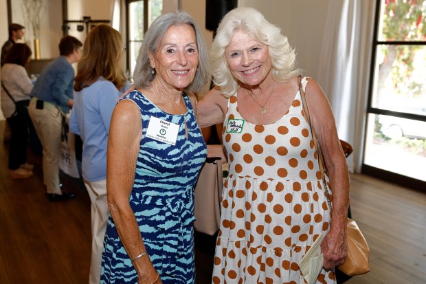 Cheryl Vivers with Emily Andrade (Encinitas Education Foundation) (Jon Clark)