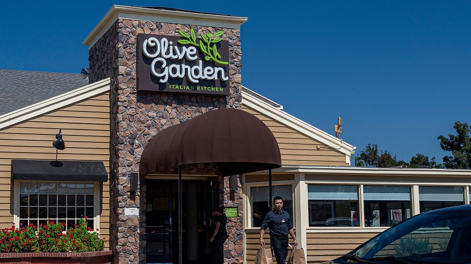 Exterior of an Olive Garden Italian Kitchen restaurant.
