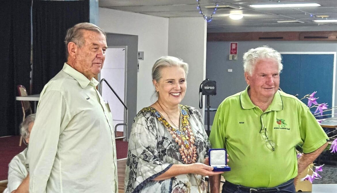 Gardener Peter Constable receives special medallion for his efforts in local club
