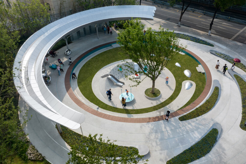 concentric pathways and gardens encircle HID landscape architecture's connective urban node in hubei, china