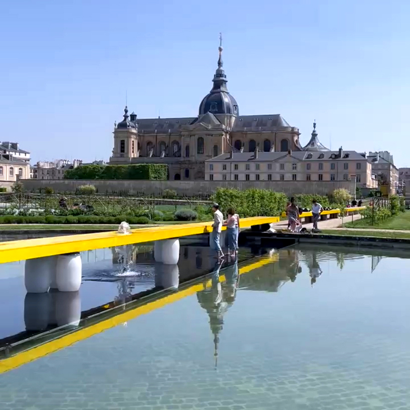 studio 5•5 stretches linear table through versailles' gardens as open dialogue on climate