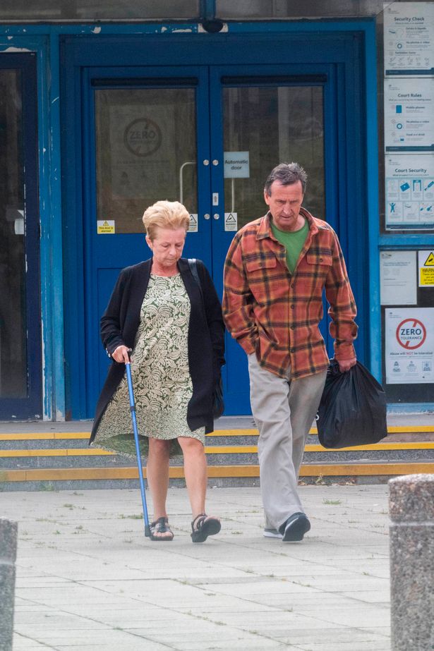 Pictured: Lorraine Hutton and husband Michael leaving Poole Magistrates Court.
