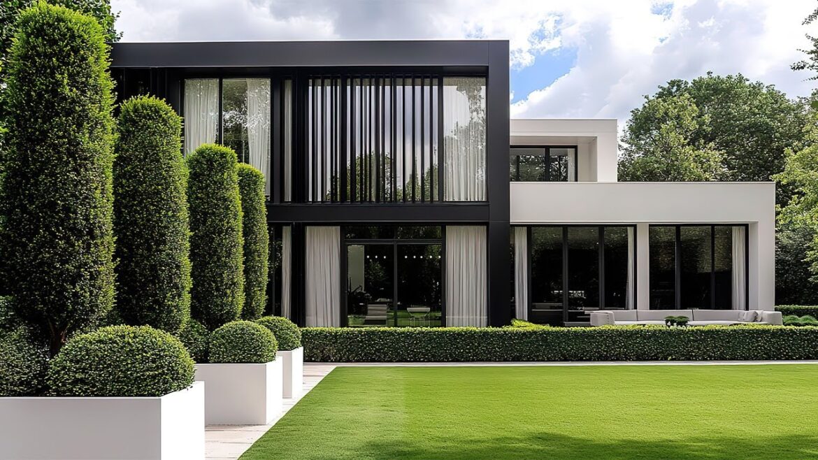 Modern Minimalist Black and White Home with Sculpted Geometric Garden Design Modern Minimalist Black and White Home with Sculpted Geometric Garden Design
