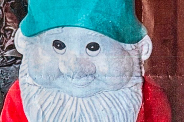 The garden gnome suffered a broken leg
