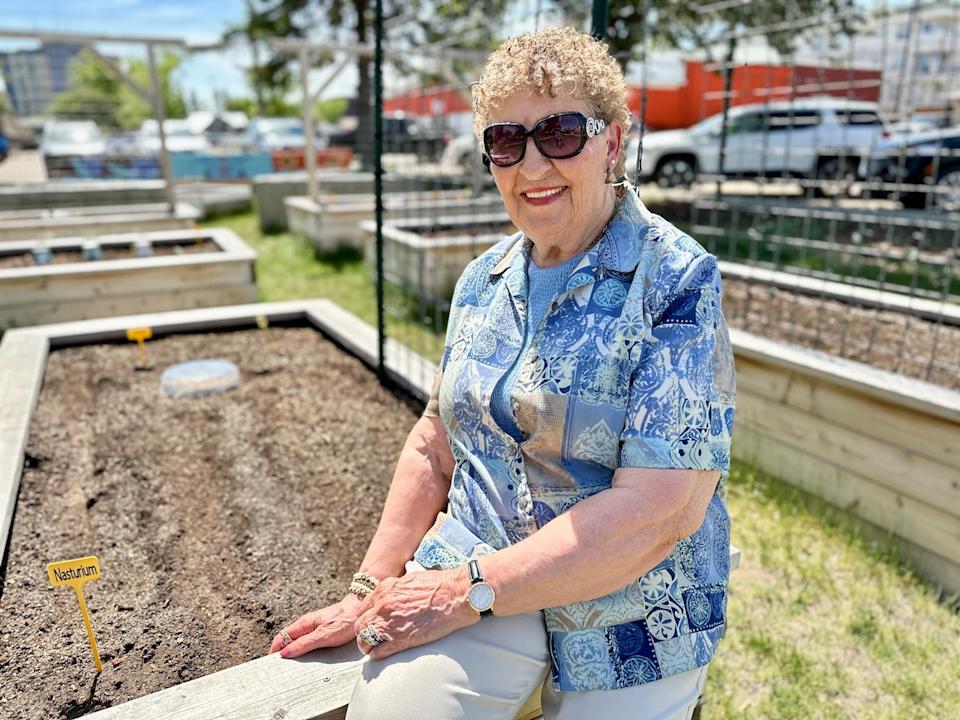 86-year-old Wallie Barnsley enjoys volunteering and visiting in the Lloyd Public Garden not far from her apartment. 