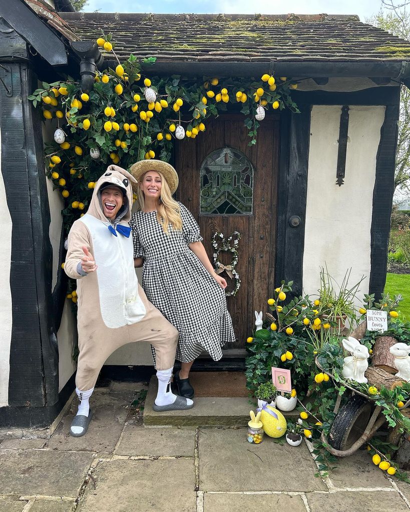 Stacey and Joe outside Pickle Cottage
