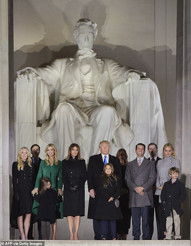 President-elect Donald Trump and family pose at the end of a welcome celebration at the Lincoln Memorial in Washington, DC, on January 19, 2017
