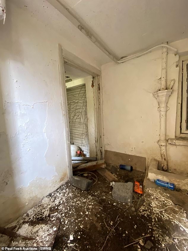 Images of the vacant home show one room that needs a colossal amount of work, including plastering, new plumbing, floor construction and a possible overhaul of the electrics