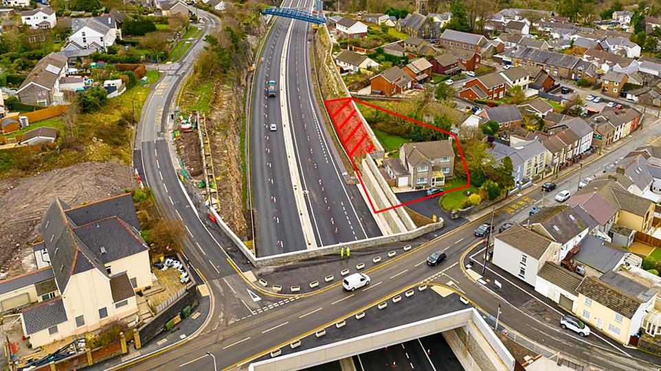 An aerial view shows the road and the positioning of Mr Watkeys house and garden in relation to the traffic