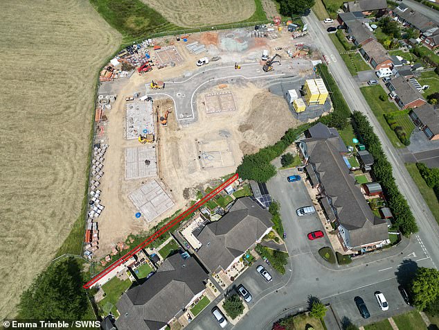 Aerial view of the Housing Plus Group development and homes on Percy Thrower Avenue. Marked is the disputed land