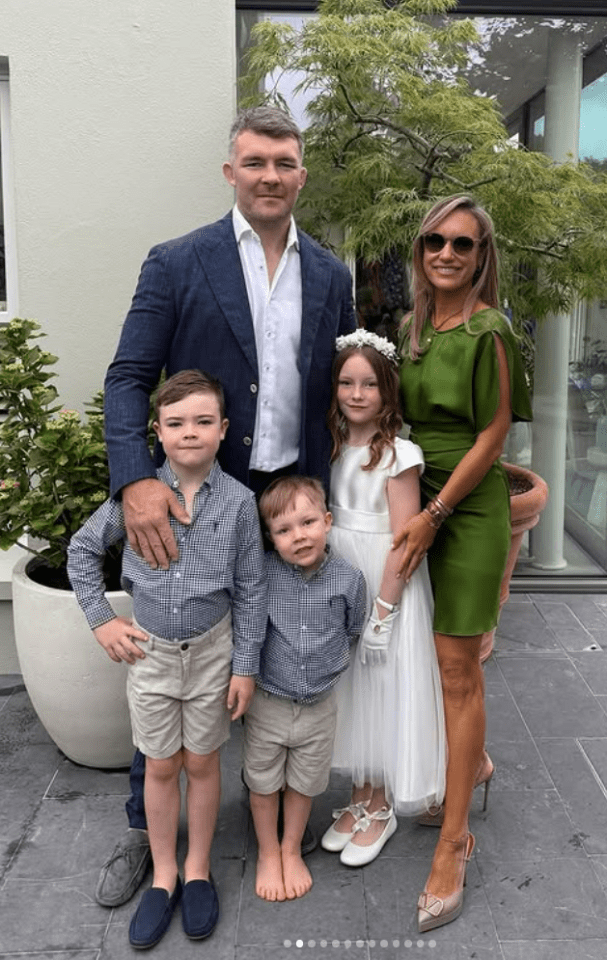 Family portrait of two parents and three children.